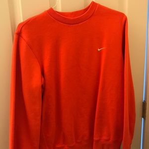 Orange Nike sweater